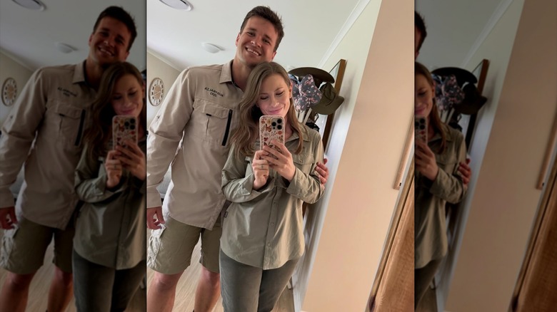 Bindi Irwin and Chandler Powell taking a mirror selfie