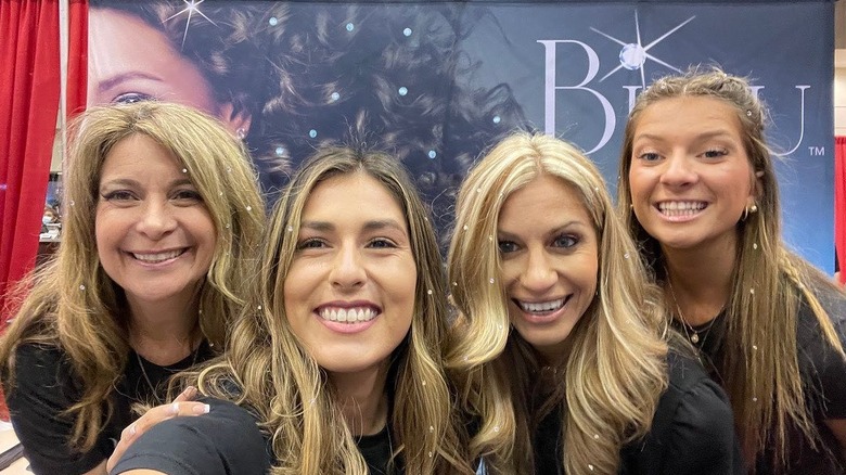 Angie Cella with employees