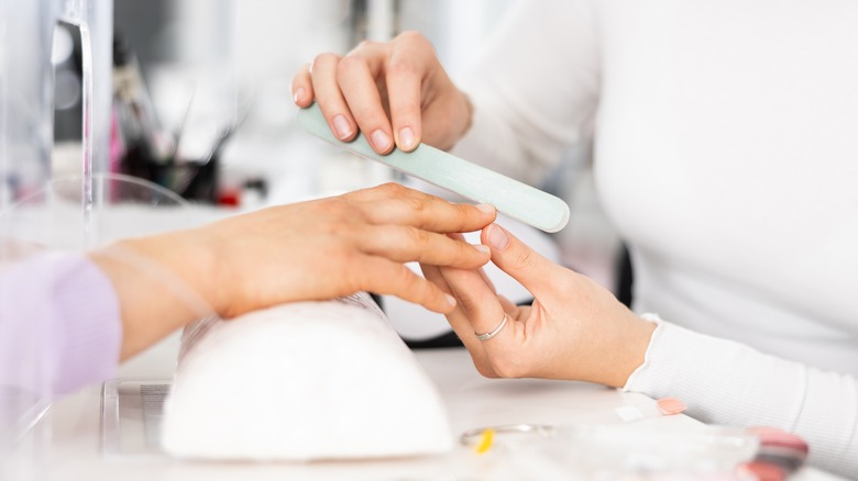 Woman getting a manicure