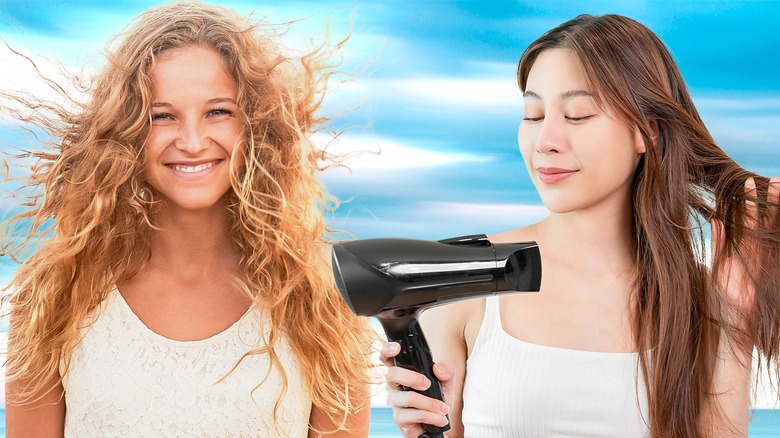 women blow drying hair 