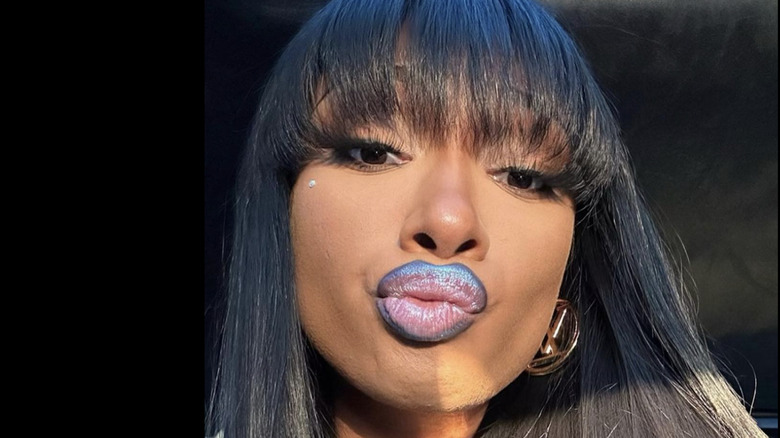 Megan Thee Stallion showing blueberry lip on Instagram