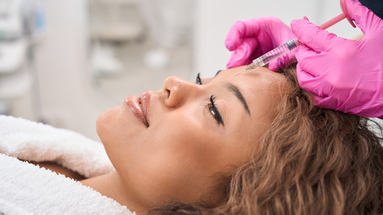 woman getting Botox in forehead