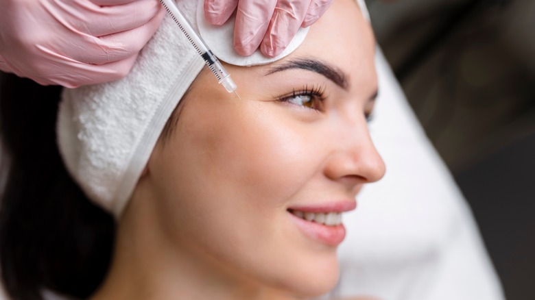 Woman getting Botox injections