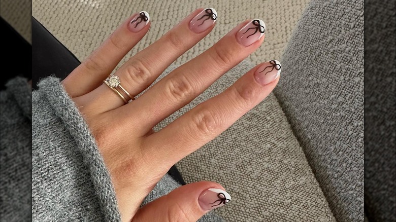 rounded french tip nails black bows