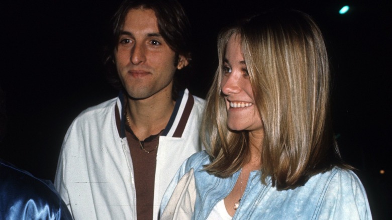 Chris Mancini and Maureen McCormick arrive at an event in 1977
