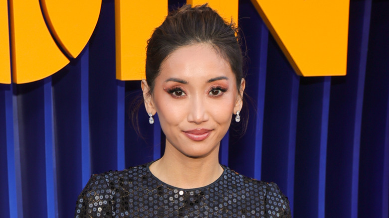 Brenda Song in a sequined dress