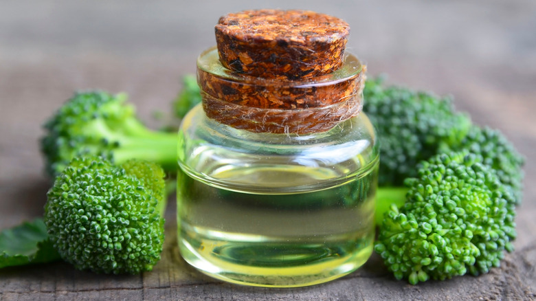 Broccoli seed oil in glass jar