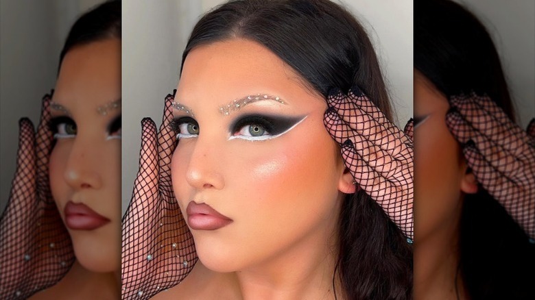 woman with eyebrow gems