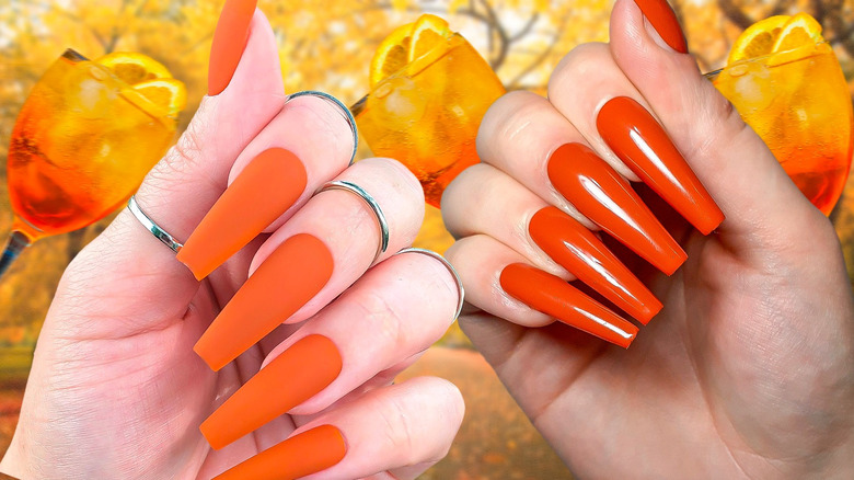 Female hand with beautiful bright summer manicure - coral, red orange nails  against mint green background. Nail care concept Stock Photo - Alamy