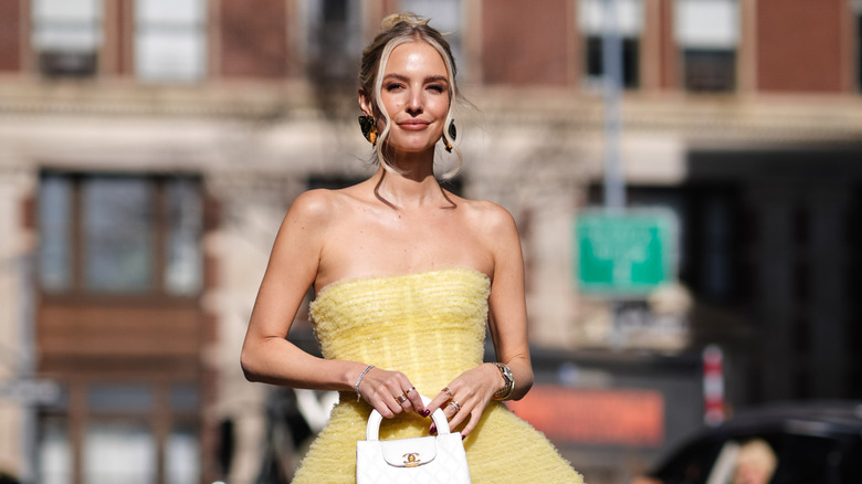 woman with yellow minidress