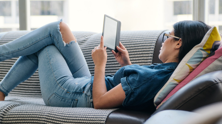 Woman reading e-reader