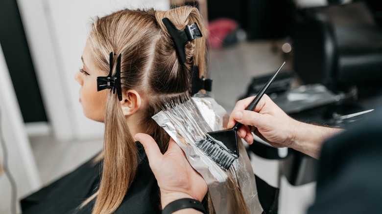 Woman's hair being dyed