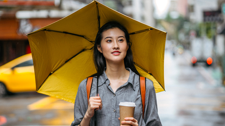 Woman holding umbrella