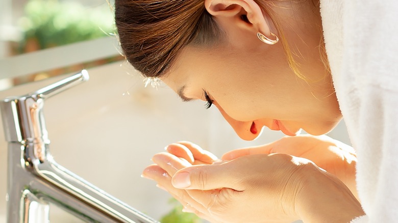 female wash face