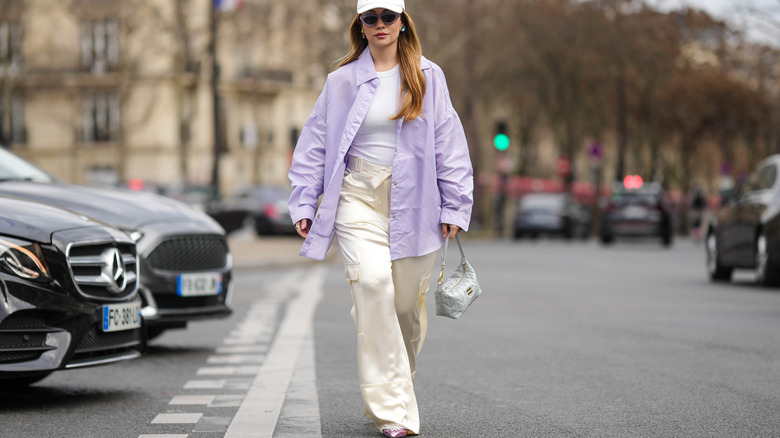 woman wearing white cargo pants