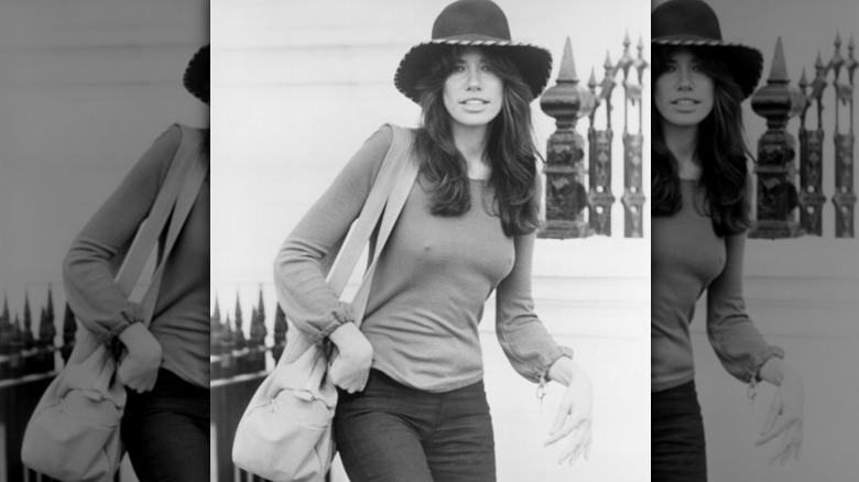 Carly Simon in one of her most iconic photos wearing a wide-brimmed hat