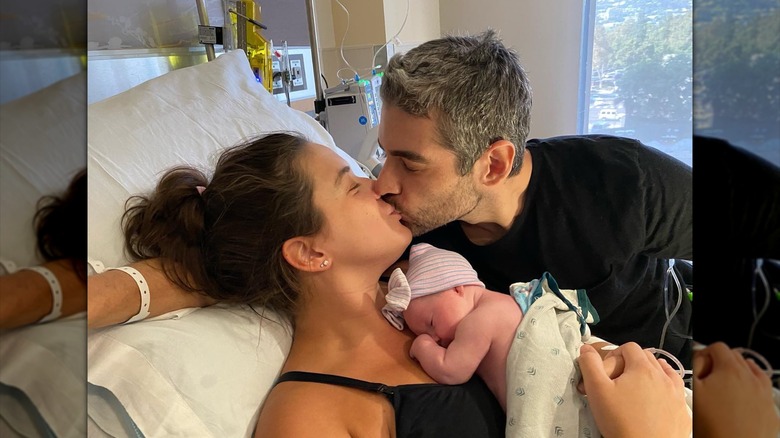 Alaia Baldwin with her husband and newborn daughter Iris