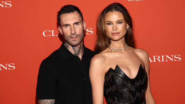Adam Levine and Behati Prinsloo at the Clarins "A Night of Extra" Beauty Evening in March 2026 in Los Angeles