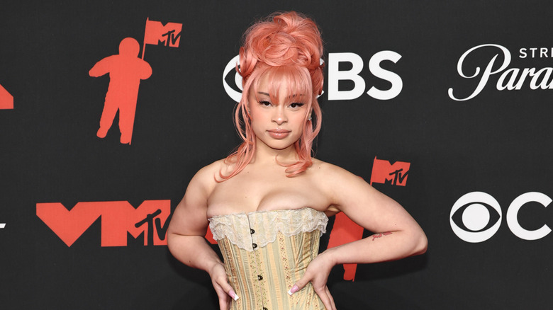 Ice Spice posing in a corset