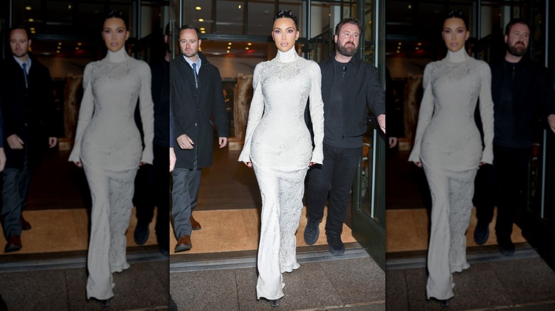 Kim Kardashian walking in a white dress in New York City