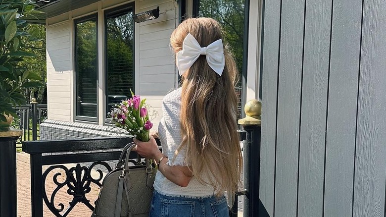 White bow in long hair