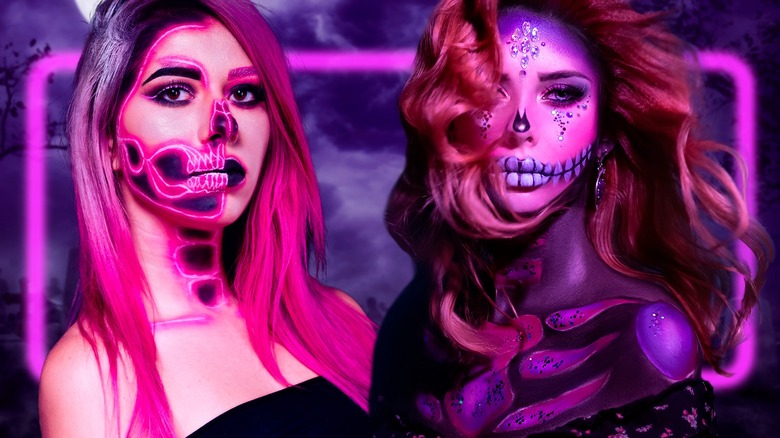 Girl with pink skeleton makeup on a spooky background.