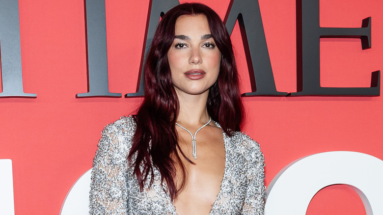 Dua Lipa with cherry cola hair