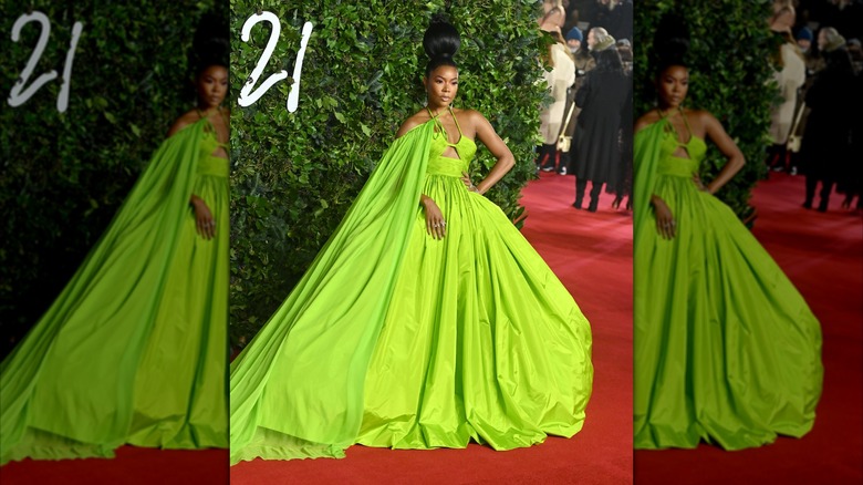 Gabrielle Union wearing a green dress with matching cape