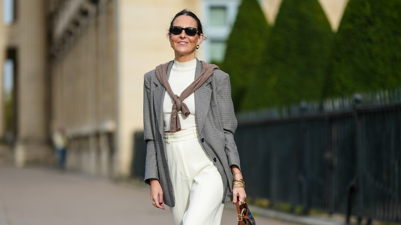 woman with sweater around shoulders