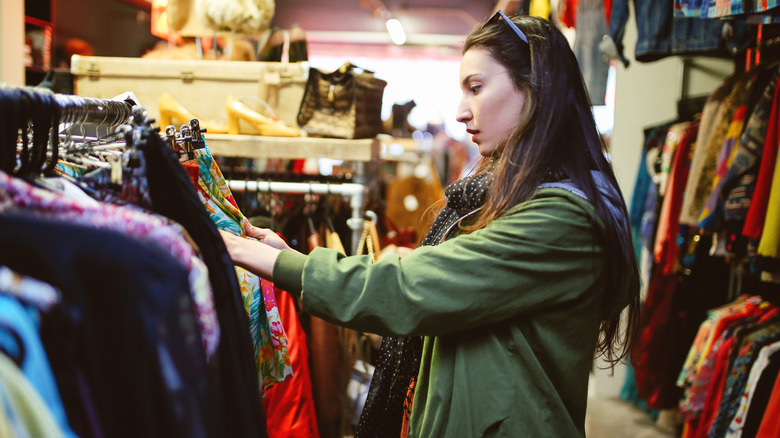 Woman shops at thrift store