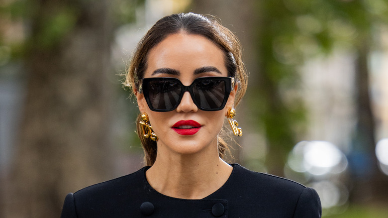 Red lipstick and black outfit