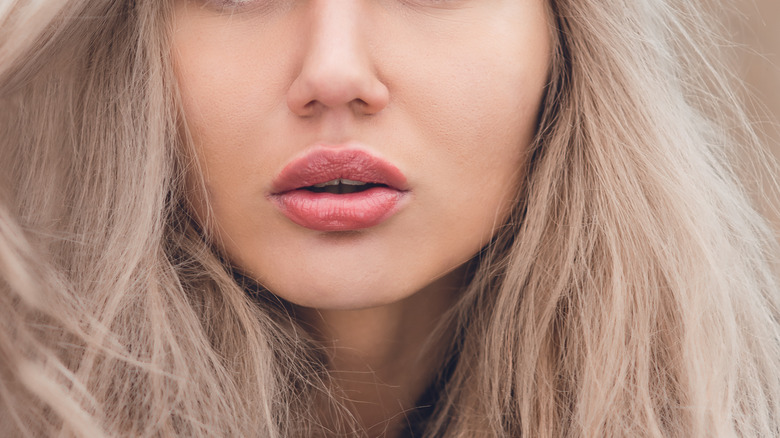 A woman with cloud lips 