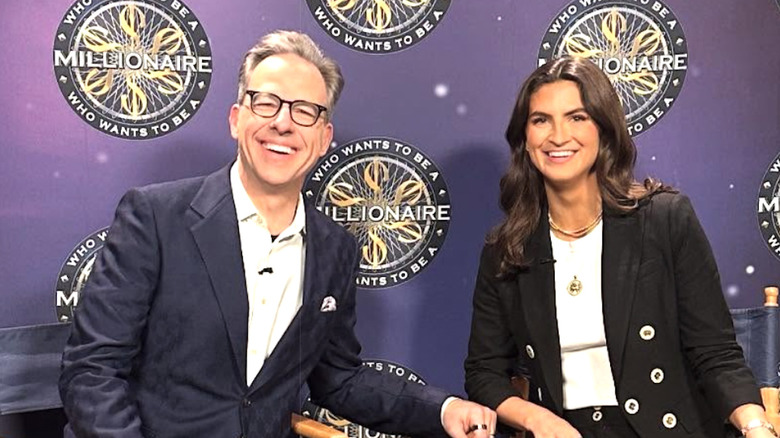 Kaitlan Collins smiles while sitting backstage before appearing on "Who Wants to be a Millionaire"