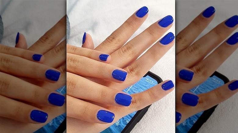 close up of cobalt blue nails