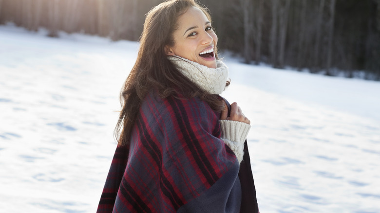 woman walking in the snow