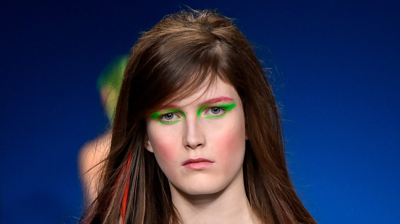 Model with color block cat eye