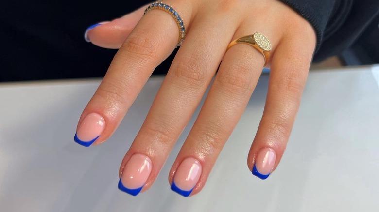 manicure with blue French tips