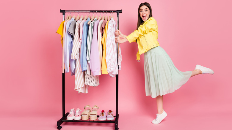 woman with clothes rack