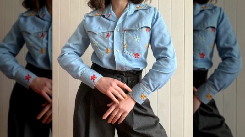 Model in denim button-up shirt