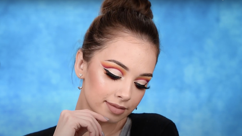 woman posing with cut crease eyeshadow 