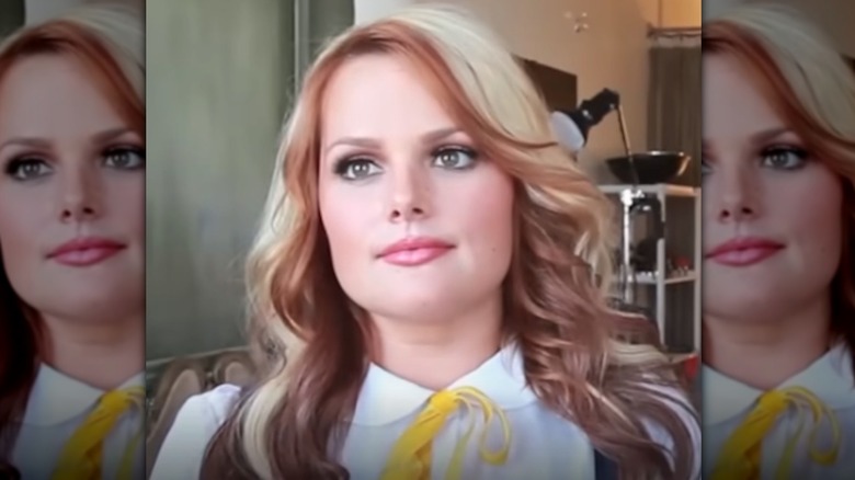 Brittany Ashton Holmes smiles at a reunion photo shoot