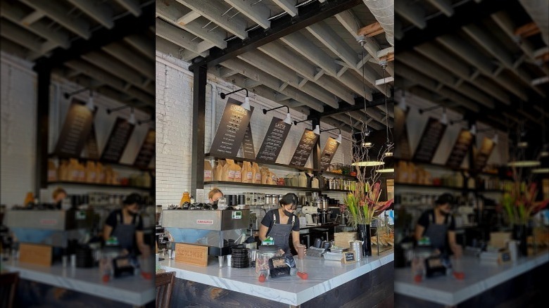 barista making a coffee