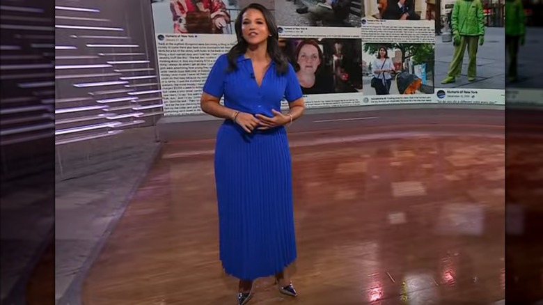 Laura Jarrett wearing a blue dress