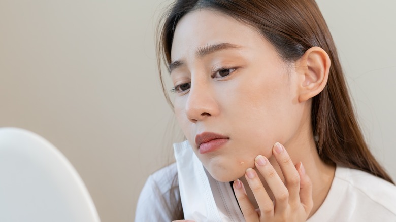 female mask acne