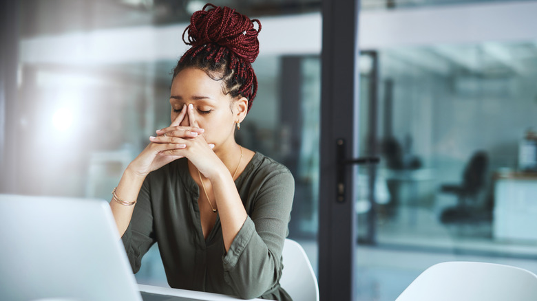 Stressed woman at work
