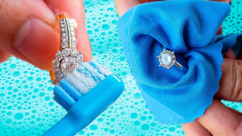 Washing jewelry over blue background