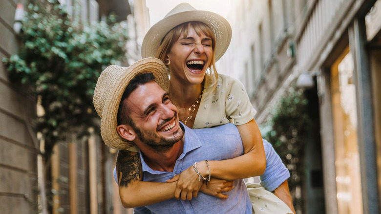 Laughing couple on the street