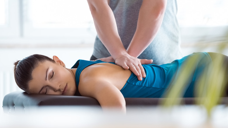 Woman at chiropractor's office