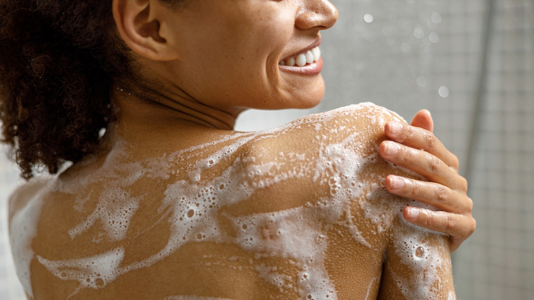 Woman washing in the shower