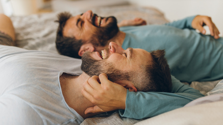 Two men in bed